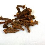 Cloves on a white background.
