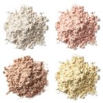 four heaps of food powders. Food powder agglomeration.