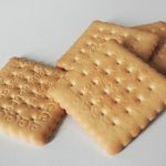 Semi-digestive biscuits, square ones on a white background.