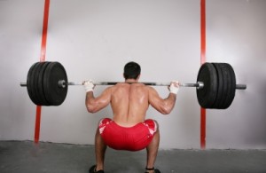 A man lifting weights. Photo by David Castillo Dominici. Courtesy of FreeDigitalPhotos.net