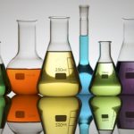 Lab equipment with colored liquid (mainly conical flasks)