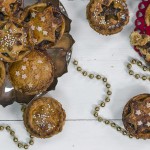 A variety of mince pies on a white table.