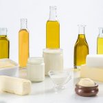 Culinary variety of fats on white background. Stability of edible oils is a key necessity where ever they are used.