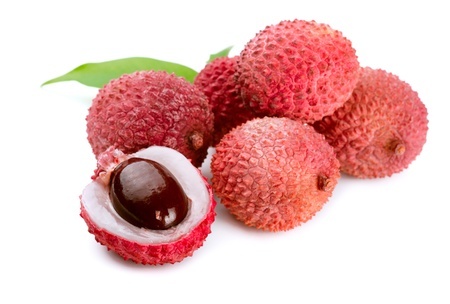 Fresh lychees (Litchi chinensis) on a white background.