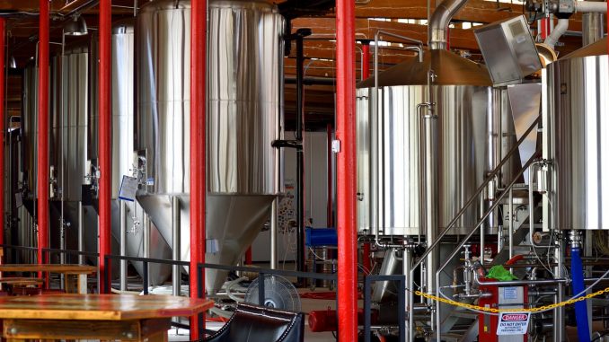 Conducting Maintenance Of Brewing Lines - a brewing house.