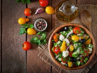 43877583 - greek salad with fresh vegetables, feta cheese and black olives