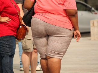 Obese people straining in their clothes.