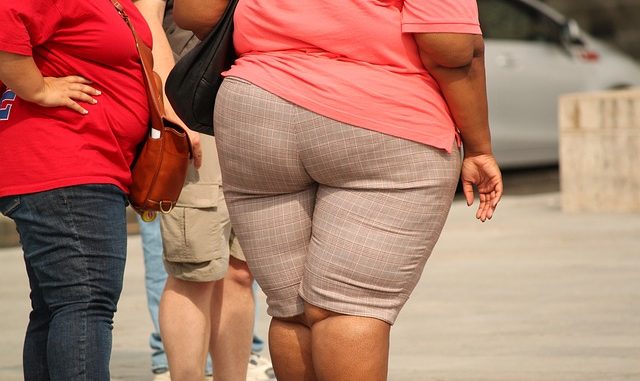 Obese people straining in their clothes.