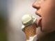 A girl licking an ice-cream. Quantitative Descriptive Analysis (QDA) is one way of being objective about the sensory profile of this type of product. A typical food emulsion.