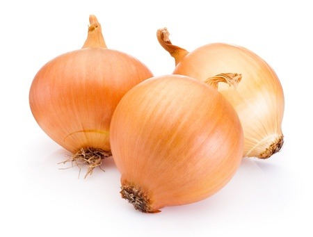 Three onion bulbs isolated on white background. Onions are a good source of quercetin.
