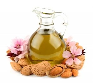 Almond oil and almond nuts. Copyright: margo555 / 123RF Stock Photo