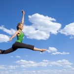 graceful jumping and dancing woman