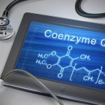 34892565 - coenzyme q10 words display on tablet over table