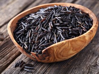 Wild rice in a wooden bowl.