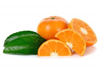 Carotenoids provide wonderful vibrant colour in these orange segments. There is a whole orange and green leaf on a white background.