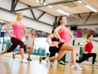 24117789 - fitness, sport, training, gym and lifestyle concept - group of smiling people exercising in the gym