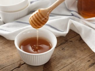 A honey dipper. Natural contaminants can be found in honey but we wouldn't always know it.