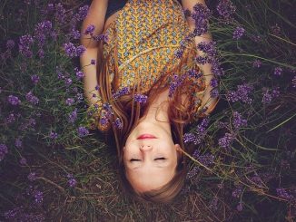 Lavender. A girl asleep in a lavender field. experiencing the power of lavender oil maybe ?