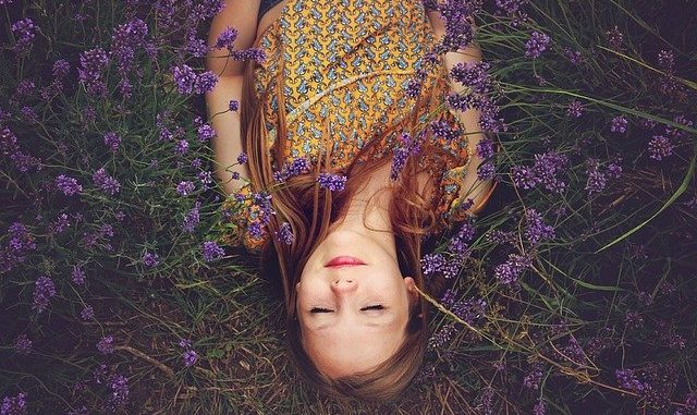 Lavender. A girl asleep in a lavender field. experiencing the power of lavender oil maybe ?