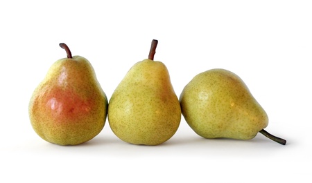 Three juicy ripe golden pears on white background. Healthy food.
