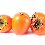Pile of ripe fresh tropical fruit persimmon prepared for eating