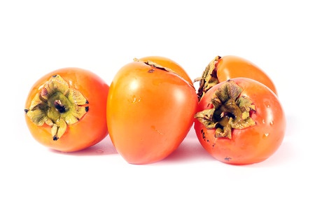 Pile of ripe fresh tropical fruit persimmon prepared for eating