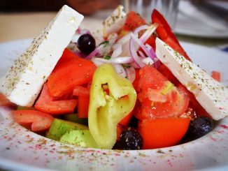 Mediterranean diet with cheese, tomato and pepper.