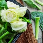 Green vegetables which suffer degradation of chlorophyll when they are processed.