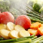 Steam cooking of vegetables.
