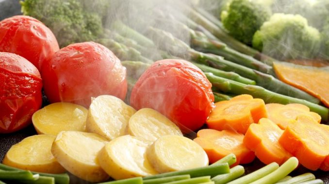 Steam cooking of vegetables.