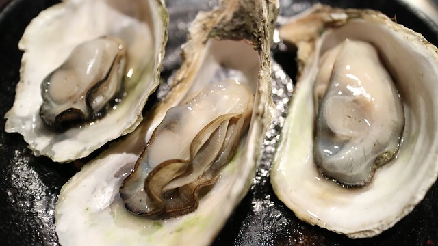 Open oysters in their shells.