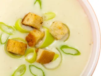 Leek and Potato soup with croutons Selective focus