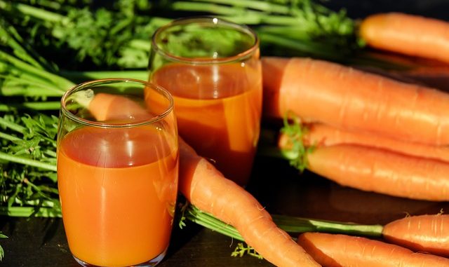 carrots and carrot juice as a source of carotenes.