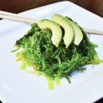 wakame seaweed with slices of avocado.