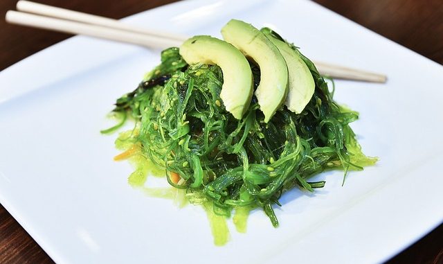 wakame seaweed with slices of avocado.