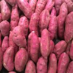 Sweet potato lined up. Pink skinned and presumably pink fleshed too.