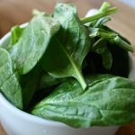 Spinach in a bowl. A good source of magnesium.