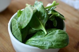 Spinach in a bowl. A good source of magnesium.