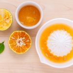 making fruit juice from orange leaving fruit and seeds which are pomace.
