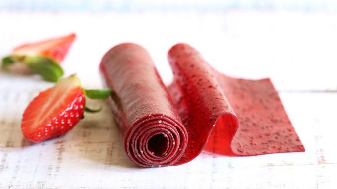Strawberry fruit leather roll-up snack