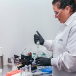 female scientist using metabolomics