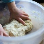 Steamed cake being prepared from a yeast-infused dough