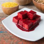 Sufu or Salty red tofu ( tofuyo, choa, ta-huri ) product of soybean on table background