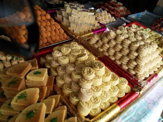 selection of indian sweets, including chum chum