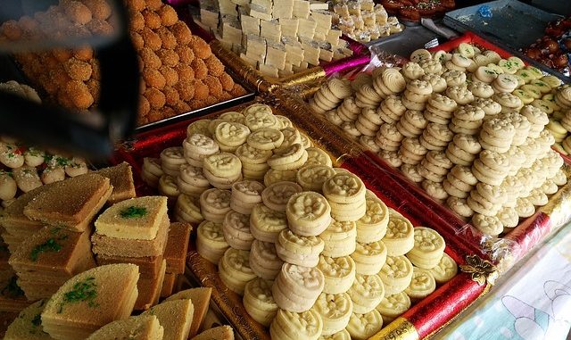 selection of indian sweets, including chum chum
