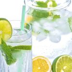 lemon water and lime water in a glass