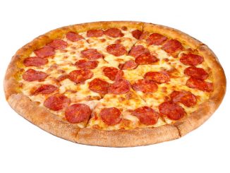 pepperoni slices on a pizza on a white background.
