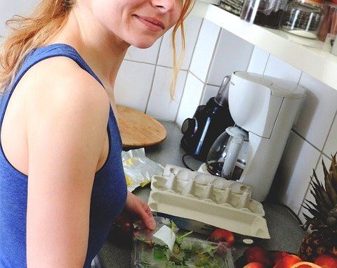 Woman making food. A meal prep opportunity.