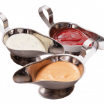 Basic sauces in a sauce boat on a white background.