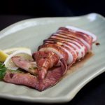 Fried squid. Squid for cooking is cleaned assiduously.